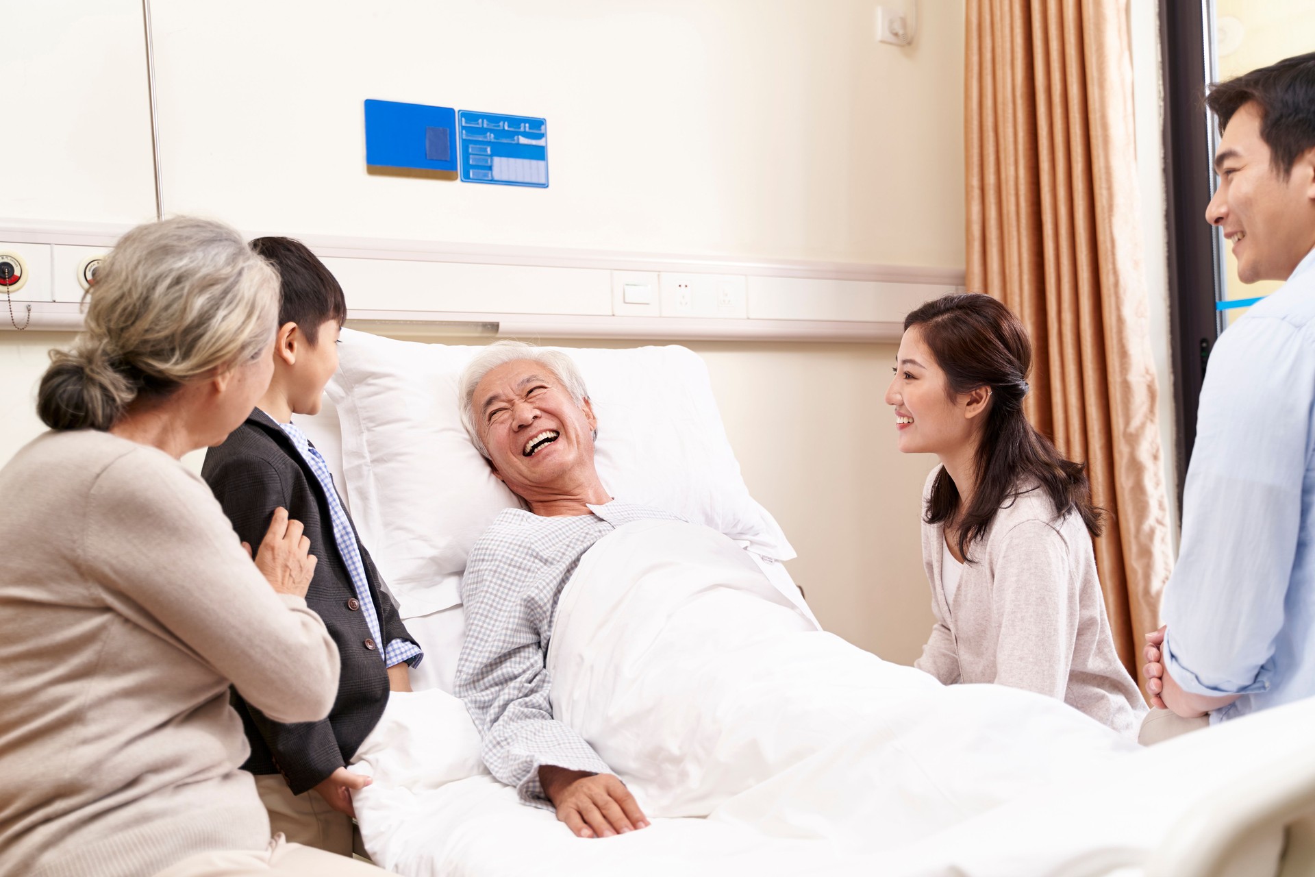 senior asian man getting a family visit